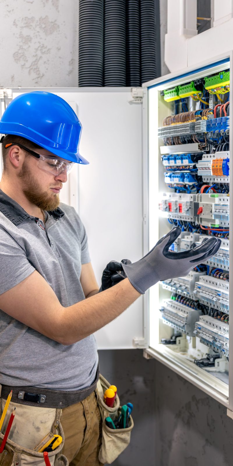 Male electrician in uniform working in a switchboard. Electricity. High quality photo. Male electrician in hard hat. A male electrician solves a problem with electricity. SSUCv3H4sIAAAAAAAAA41Py46DMAz8F5+DZEi7LPmVqodADLUKpEqcViuUf1+FUu11bzO25+EN2IEB1D1+9SNWzQnbqq5HrPqhaaqT7vT5rDuyowMFzgqBqbXuUH9j07XYNoiICnobeQCzAc9zihKssF/BoIJAq6OwQ3IsPrCdwWBWEMVKihTBbFnBYIUmH3jnH7/LVuZgABTE1BeQ1T9nVwV2onX4Kf65FJnJ7nGXq4L7SygsR7aXW6lY4CPwwOt0dEpR/PLGq5ei3RPED3d2h/j9xo2j+FCyID1mbx25Y536hUU+NNCT6fV3nXP+BX63MqKEAQAA
